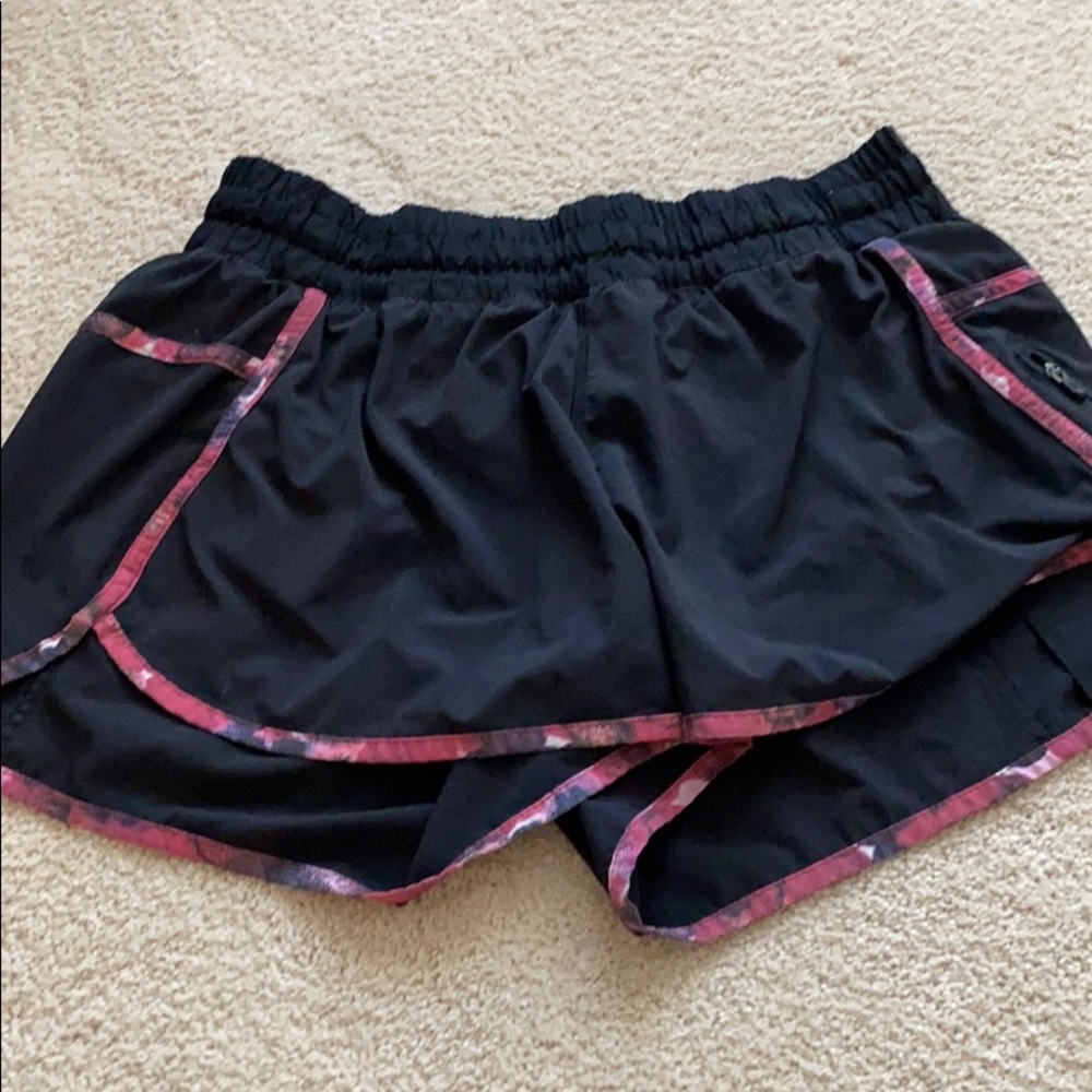 Black and pink Lululemon tracker shorts